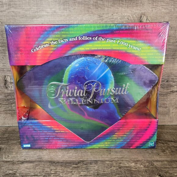 Trivial Pursuit Millennium Edition Board Game Trivia Wedge Shape Tin - Picture 1 of 10